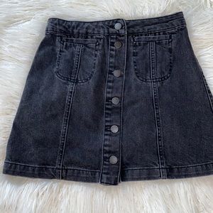 TopShop Moto black distressed denim mini skirt. Button front. Size 4
